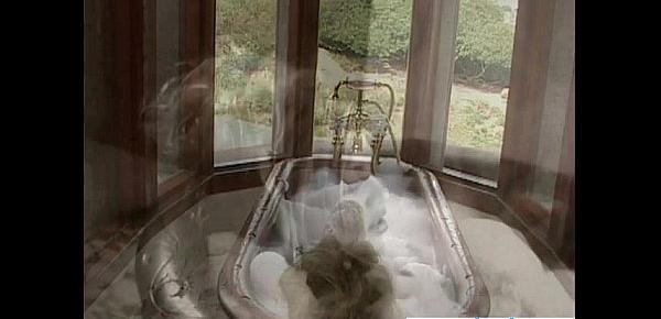  Blonde masturbates with shower in bath tub